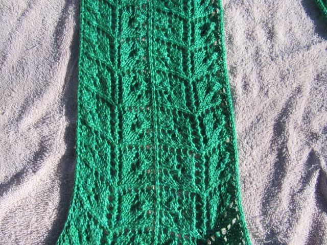 detail of green knit leafy lace